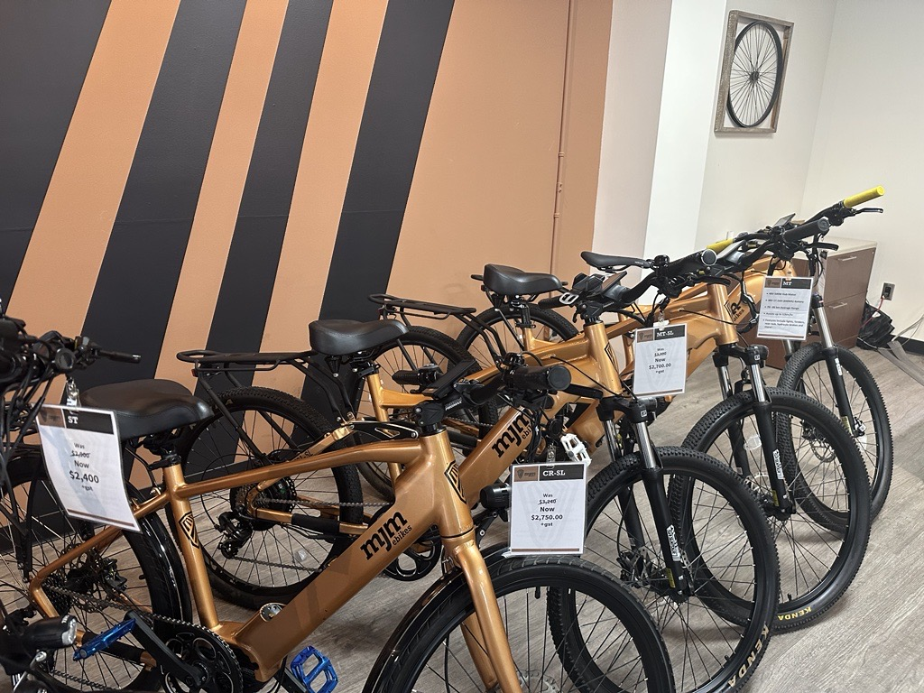 Bikes for sale lined up at MJM EBikes.